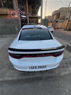 دۆج چارجەر